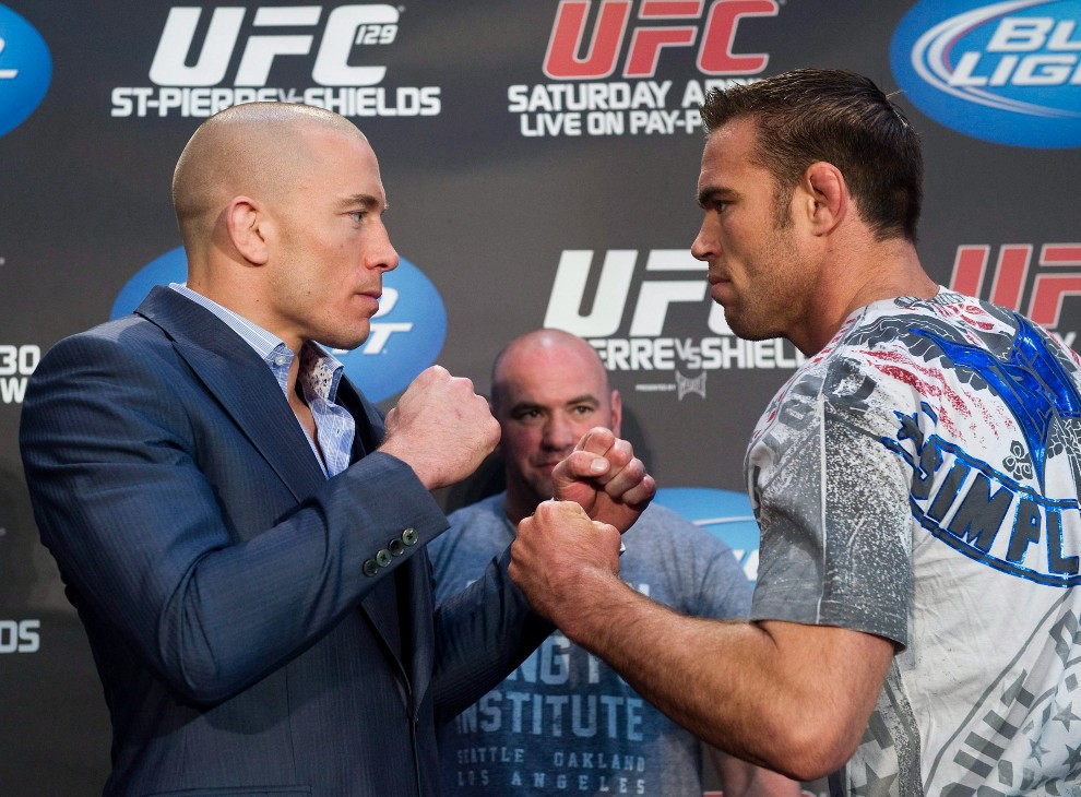 Жорж Сен Пьер (слева)