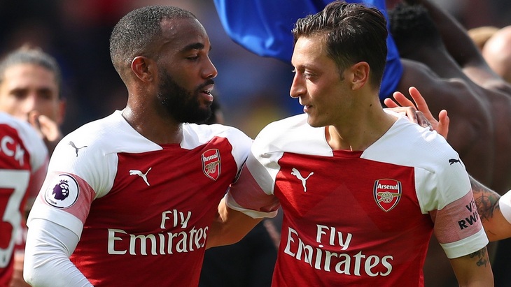 Александр Ляказетт и Месут Озил