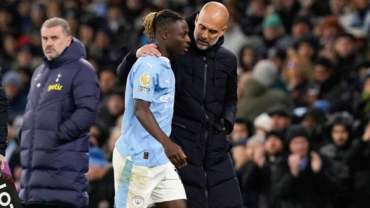 Жереми Доку и Хосеп Гвардиола